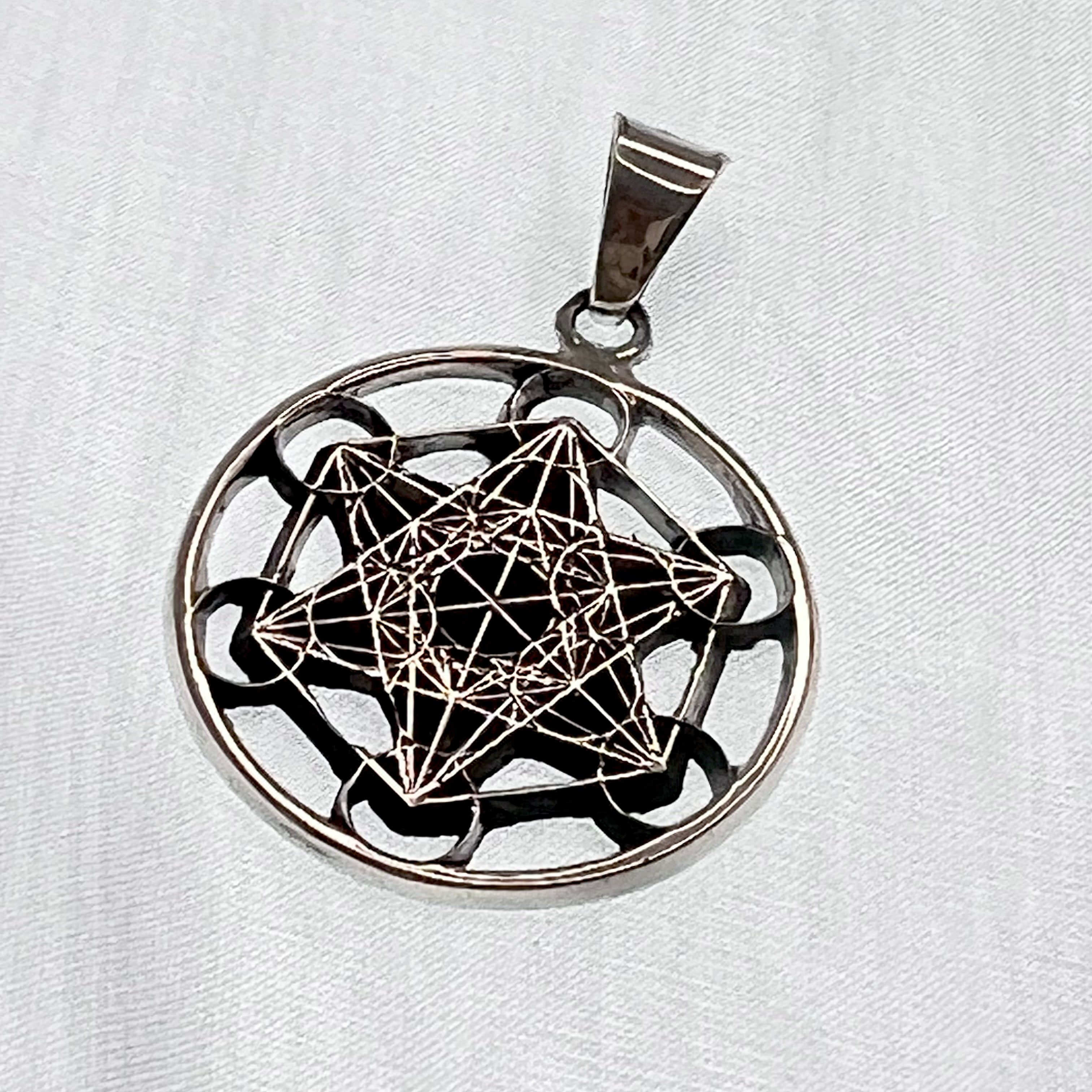 Dije Cubo Metatrón plata.