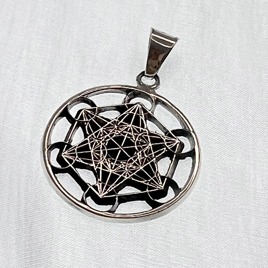 Dije Cubo Metatrón plata.